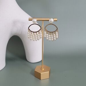 Stainless steel gold tone pearl evil eye earrings